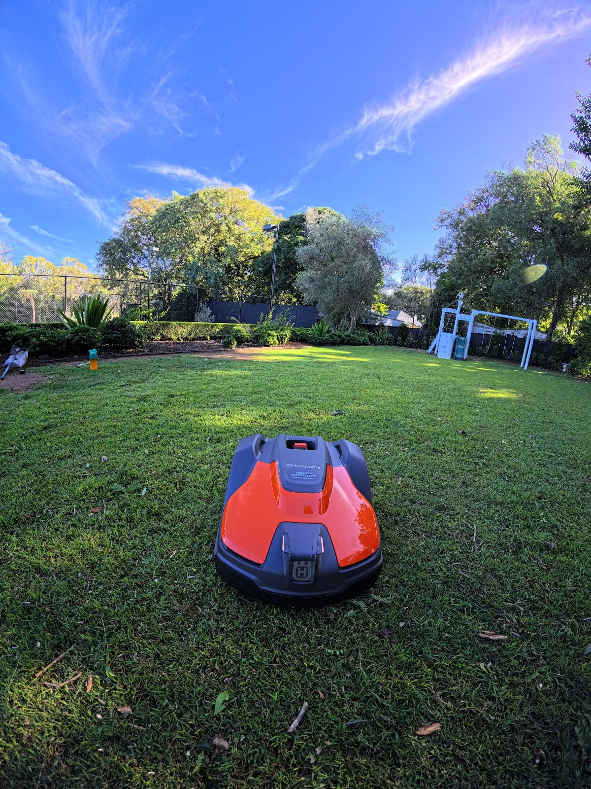 Automower 540 EPOS on lawn near trees