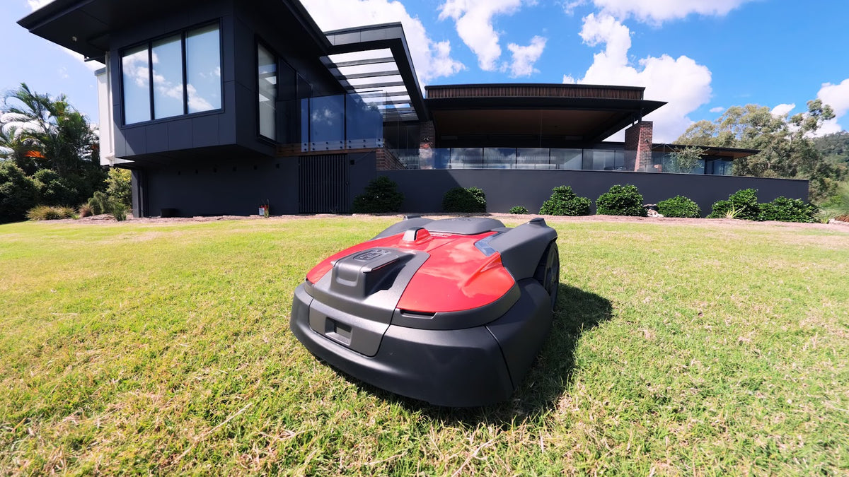 Automower 580 EPOS wide shot on residential lawn