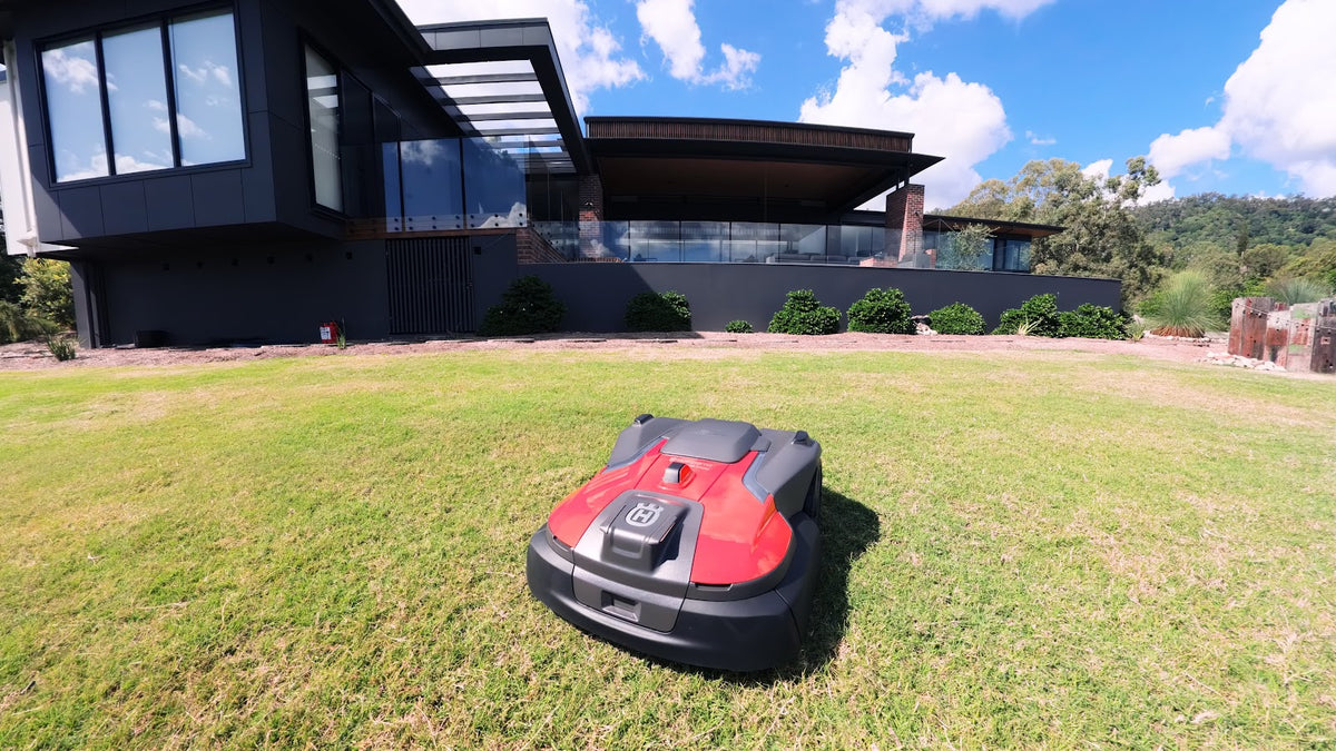 Automower 580 EPOS front view near modern house