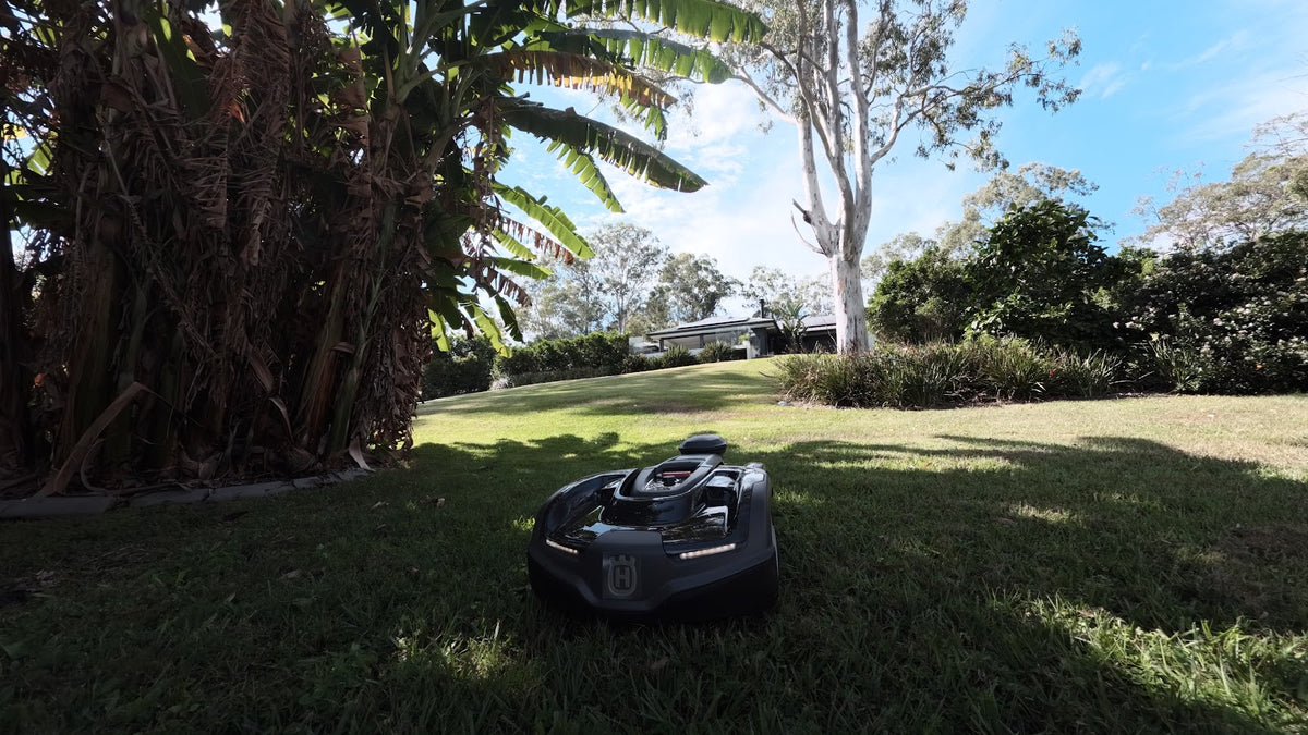 Automower 435X AWD mowing under shaded trees