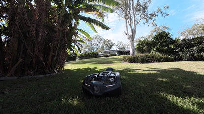Automower 435X AWD mowing under shaded trees